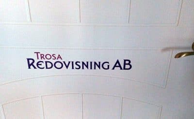Dörrskylt TrosaRedovisning